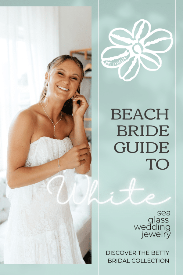 Bride in a white lace wedding dress adjusts an earring, shown beside a teal panel with the BettyBelts flower logo and the text 'Beach Bride Guide to White' and 'sea glass wedding jewelry'.