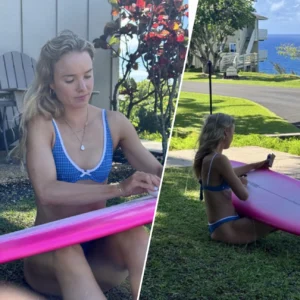 makena-waxing-her-board